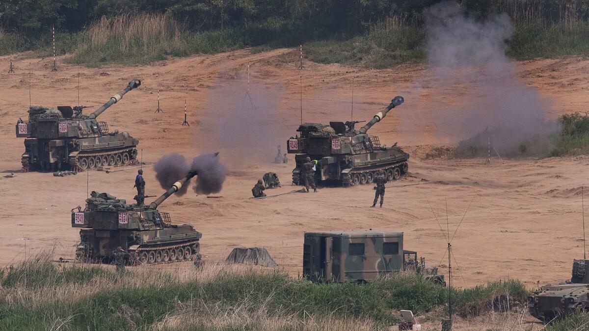 South Korean army's K-55 self-propelled howitzers fire during an annual exercise in Paju, near the border with North Korea, on May 22, 2017. South Korea's military said Tuesday, May 23, 2017, it fired warning shots at an unidentified object flying south from rival North Korea.