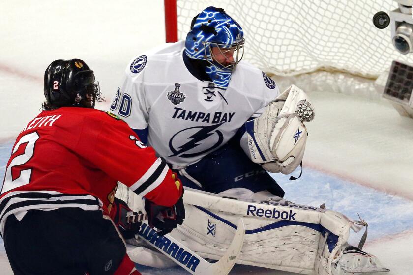 Blackhawks defenseman Duncan Keith scores past Lightning goaltender Ben Bishop on a rebound of his own shot in the second period of Game 6 of the Stanley Cup Final on Monday in Chicago.