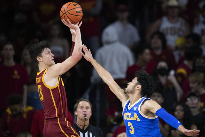 USC guard Drew Peterson shoots over UCLA guard Johnny Juzang