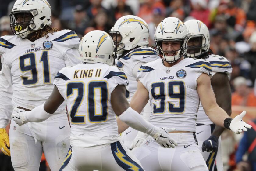 Chargers defensive end Joey Bosa dances after sacking Broncos quarterback Case Keenum in the second quarter.