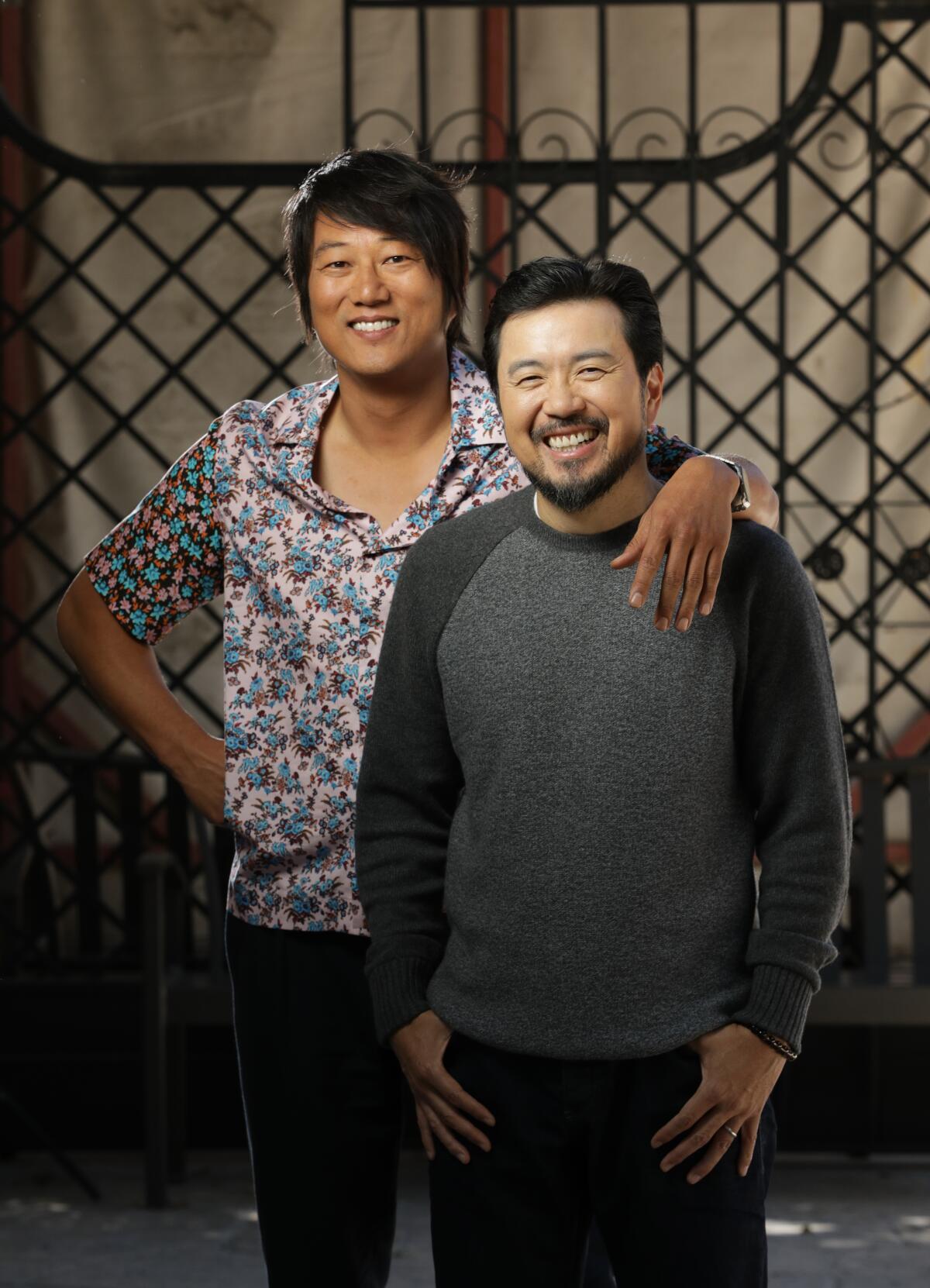 Sung Kang, left, and director Justin Lin of "F9" 