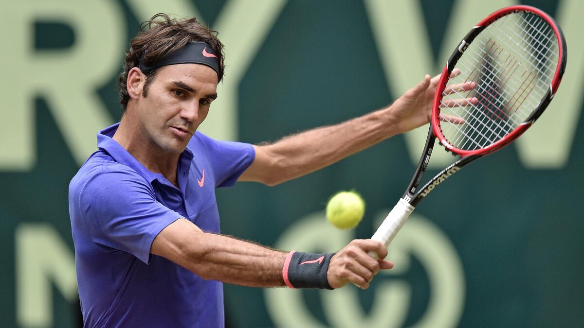 Roger Federer hits a return during his victory over Andreas Seppi for the Gerry Weber Open title on Sunday.