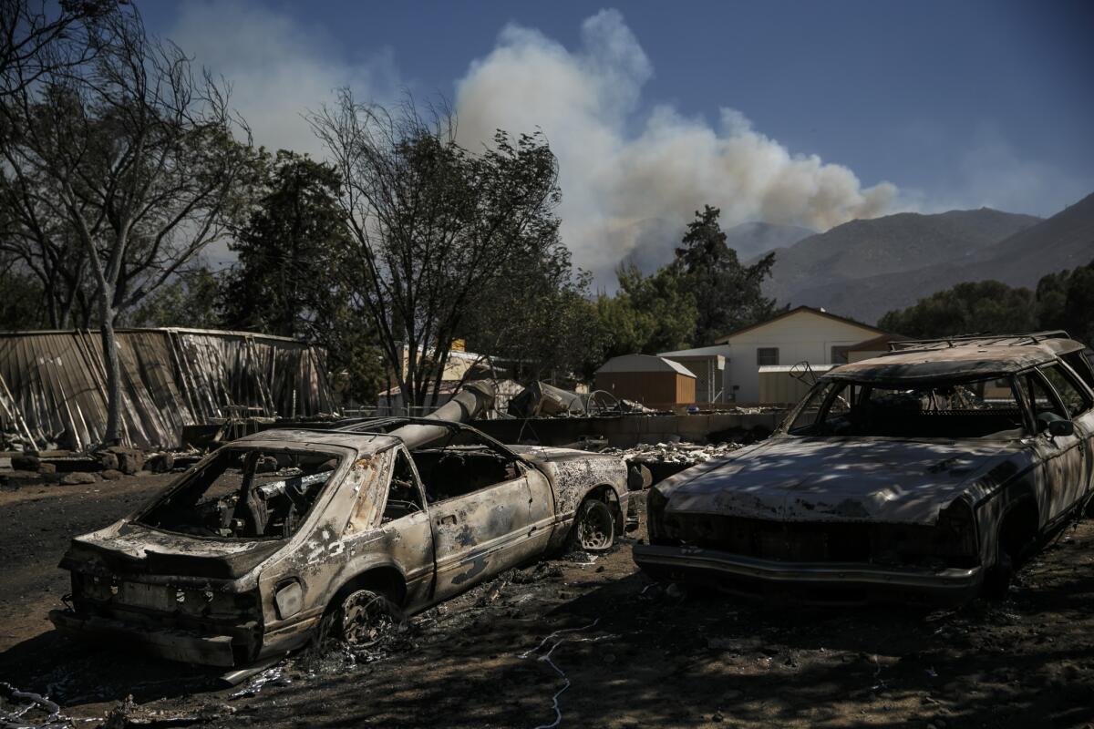 The fire tore through homes and charred cars in Lake Isabella.