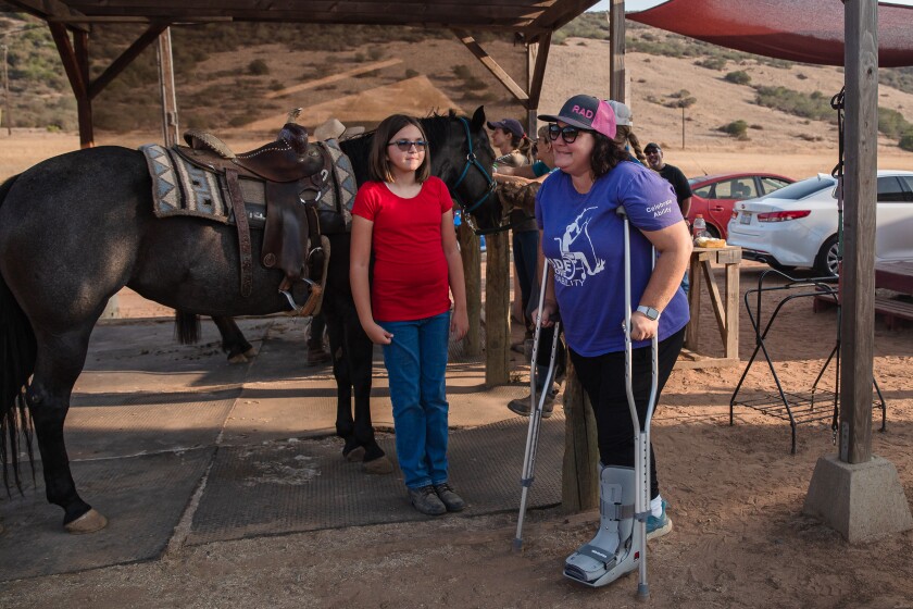 Haley Contreras and Allie Sarnataro at the Ride Above Disability Therapeutic Riding Center in Poway.