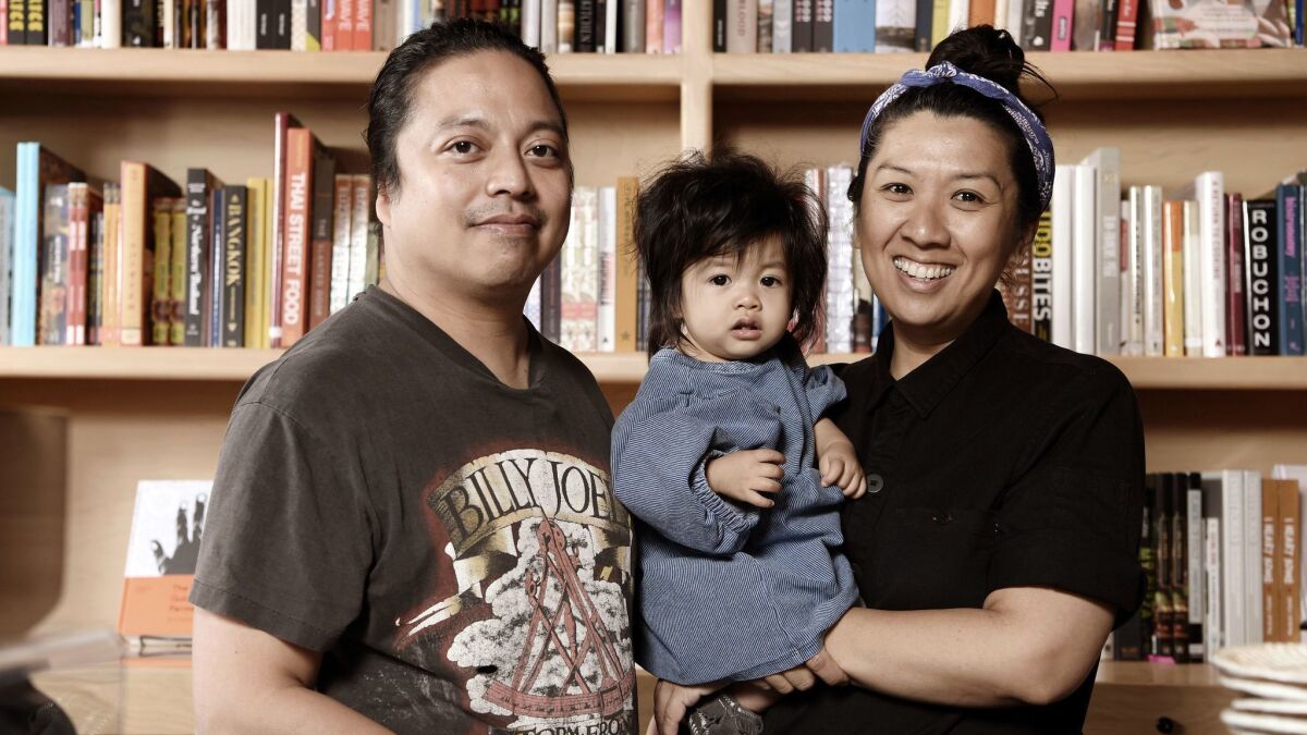 Now Serving cookbook store owners Ken Concepcion and Michelle Mungcal, and their daughter, Frankie.