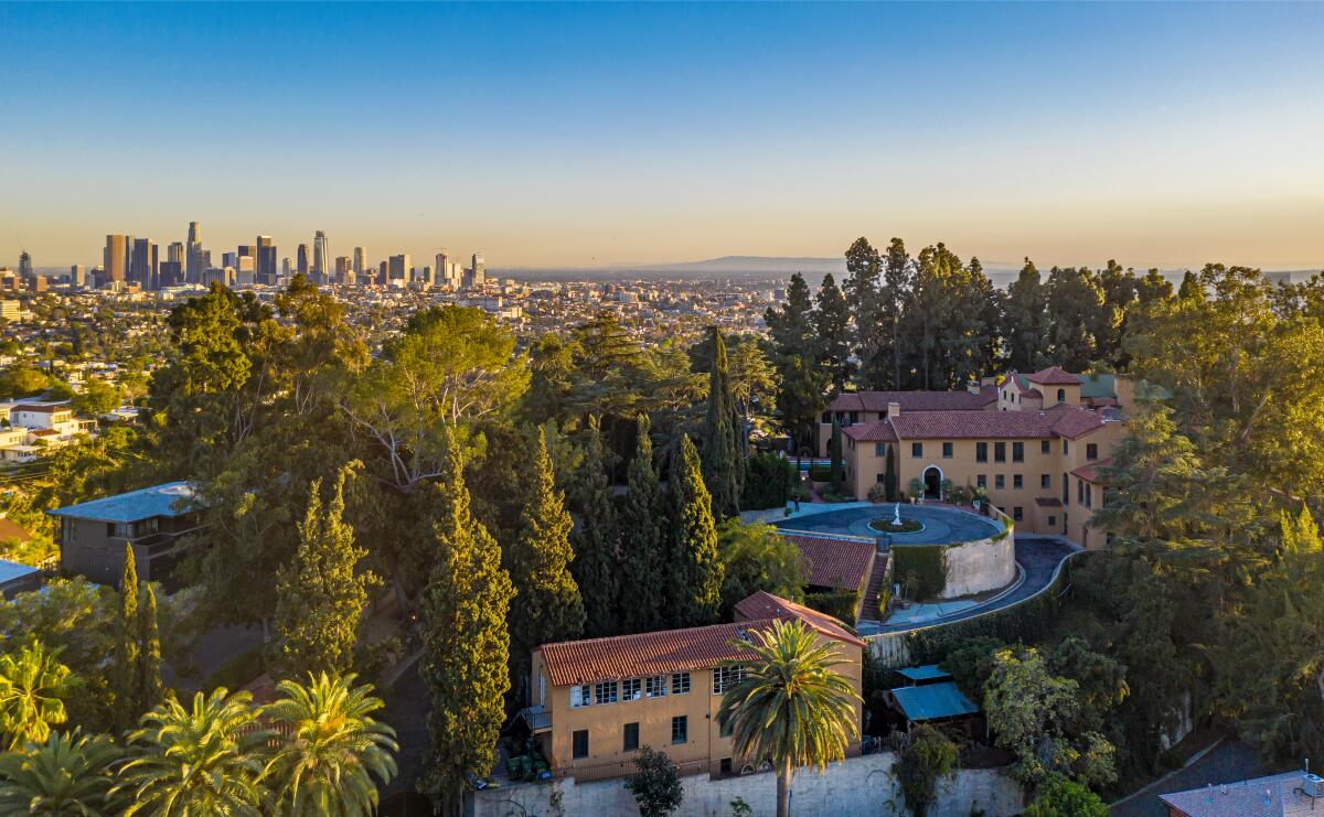 Mansion with downtown Los Angeles in background