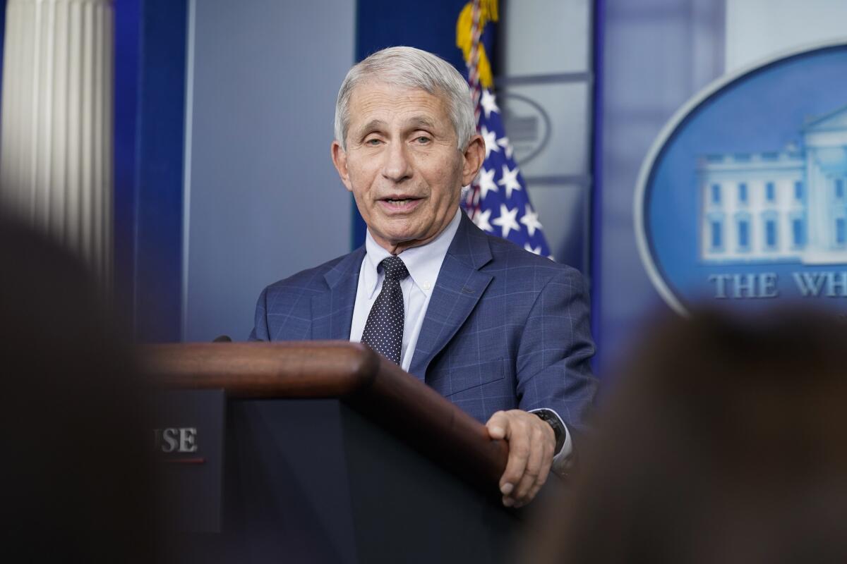 Dr. Anthony Fauci speaks at a lectern