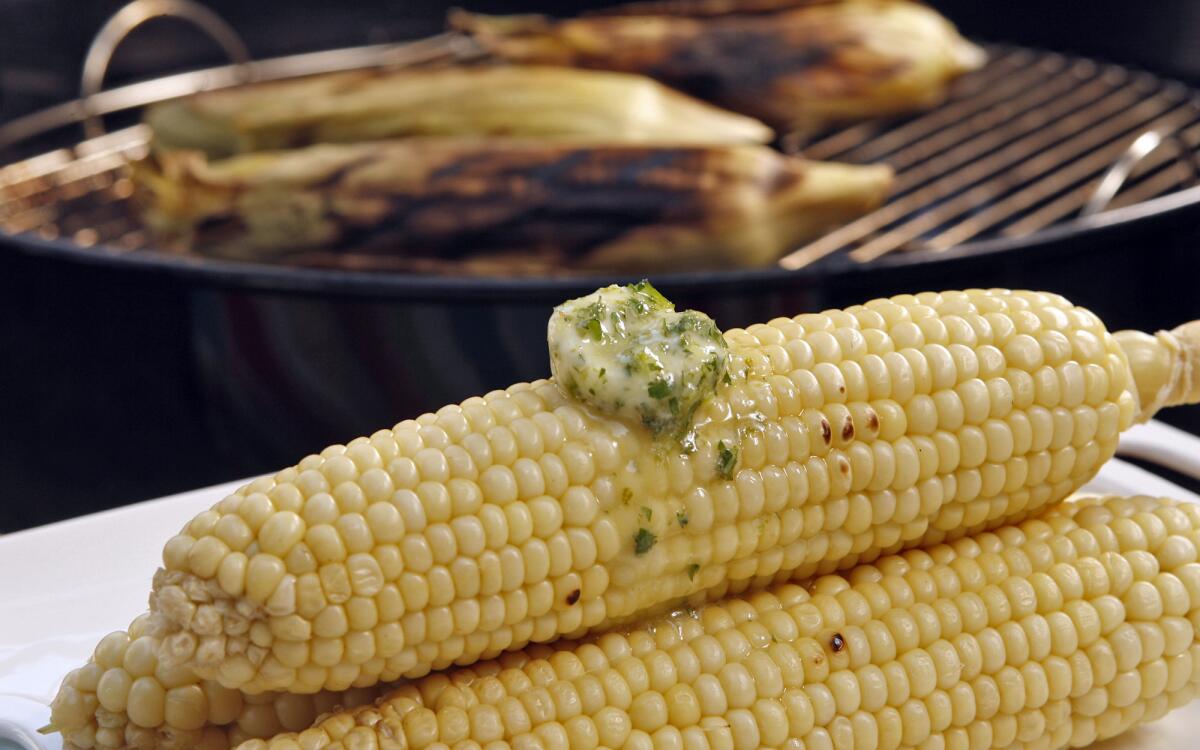 Grilled ears of corn topped with tequila-lime butter.