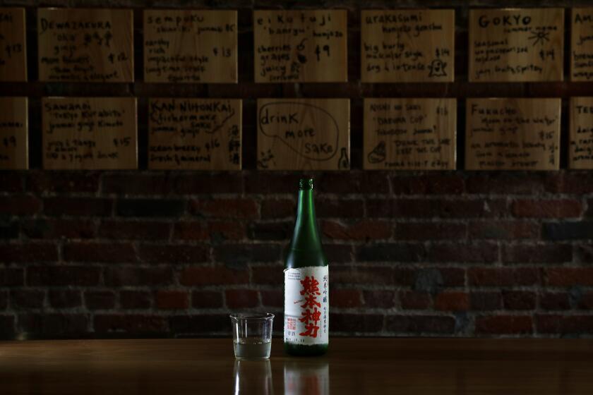 LOS ANGELES-CA-JULY 2, 2019: A glass of sake at Ototo, a new sake bar and restaurant in Echo Park, on Tuesday, July 2, 2019. (Christina House / Los Angeles Times)