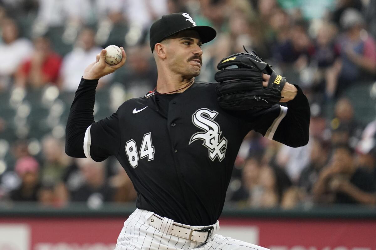 Chicago White Sox starting pitcher Dylan Cease throws against the Minnesota Twins during the first inning of a baseball game in Chicago, Saturday, Sept. 3, 2022. (AP Photo/Nam Y. Huh)