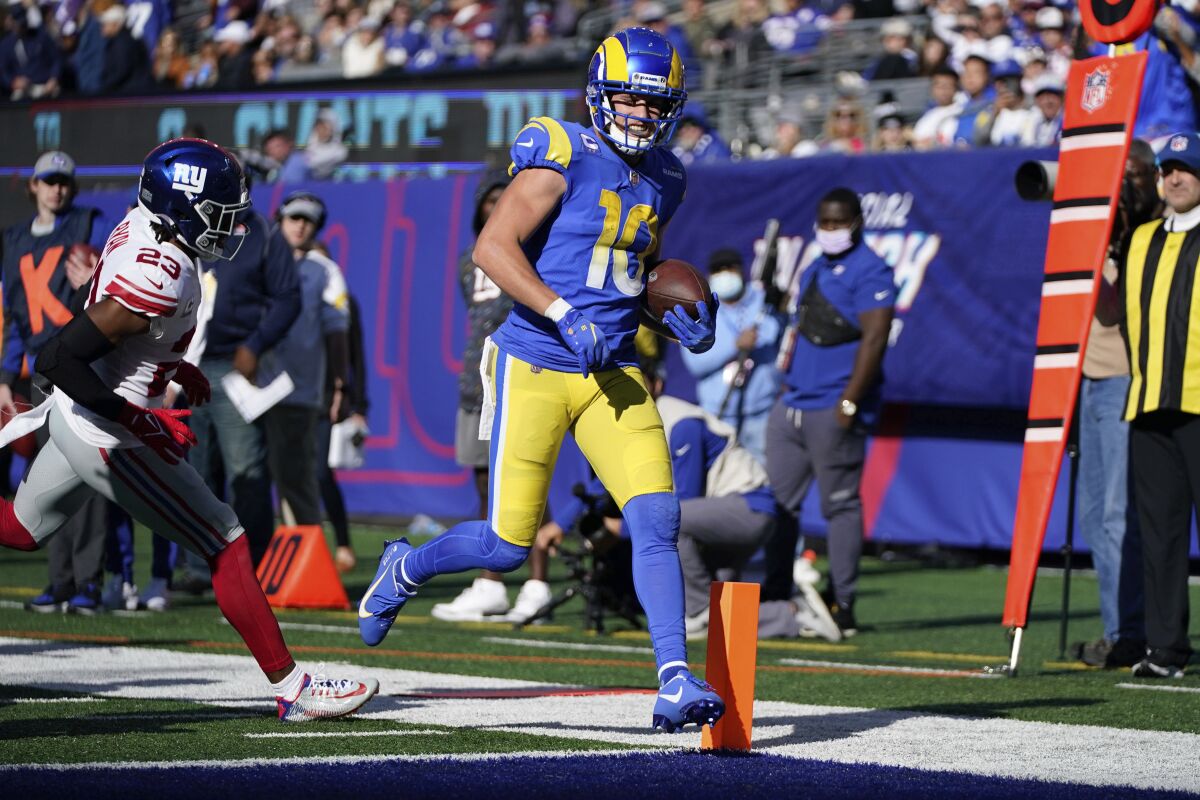 Los Angeles Rams' Cooper Kupp scores a touchdown during the second half of an NFL football game against the New York Giants, Sunday, Oct. 17, 2021, in East Rutherford, N.J. (AP Photo/Frank Franklin II)