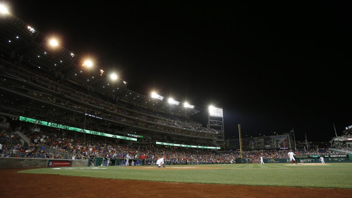 Friday's game between the Dodgers and the Washington Nationals is halted after some of the lights go out at Nationals Park.