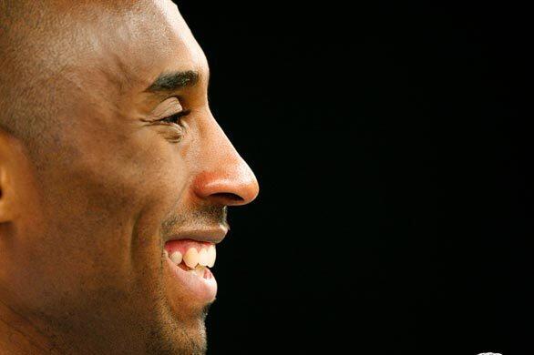 Lakers guard Kobe Bryant chuckles as he answers questions from reporters during an NBA Finals off-day practice at Staples Center.