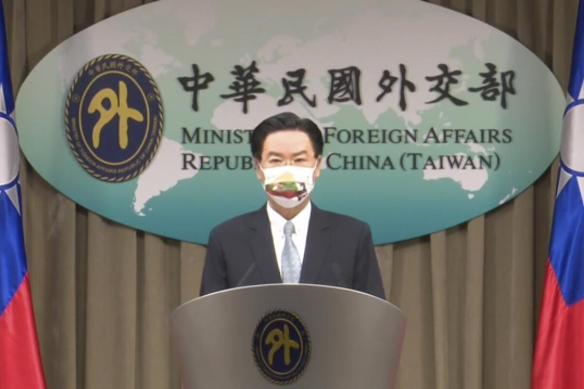 FILE - In this July 20, 2021, file image taken from a video footage run by Taiwan's Ministry of Foreign Affairs via AP Video, Taiwan Foreign Minister Joseph Wu, speaks about exchanging representative offices with Lithuania during a press briefing in Taipei, Taiwan. China on Tuesday, Aug. 10, 2021, recalled its ambassador to Lithuania and expelled the Baltic nation’s top representative to Beijing over the country’s decision to allow self-governing Taiwan to open an office in Lithuania under its own name. (Taiwan's Ministry of Foreign Affairs AP Video, File)