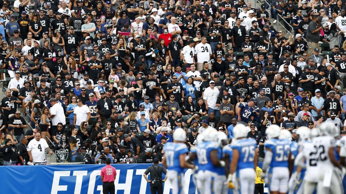 Fans of the opposing team, in this case the Oakland Raiders, help fill the stadium during games against the Chargers at StubHub Center in Carson.