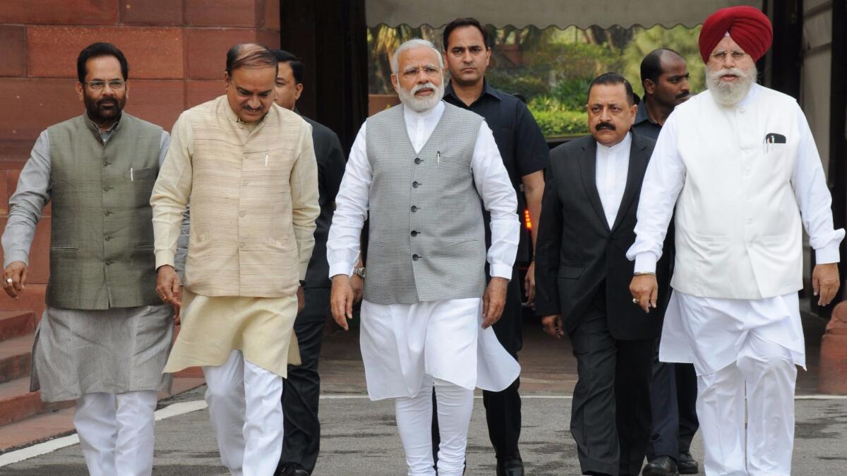 Prime Minister Narendra Modi, center, arrives to speak to the media at the resumption of the Indian Parliament's budget session in New Delhi on March 9, 2017. (European Pressphoto Agency)
