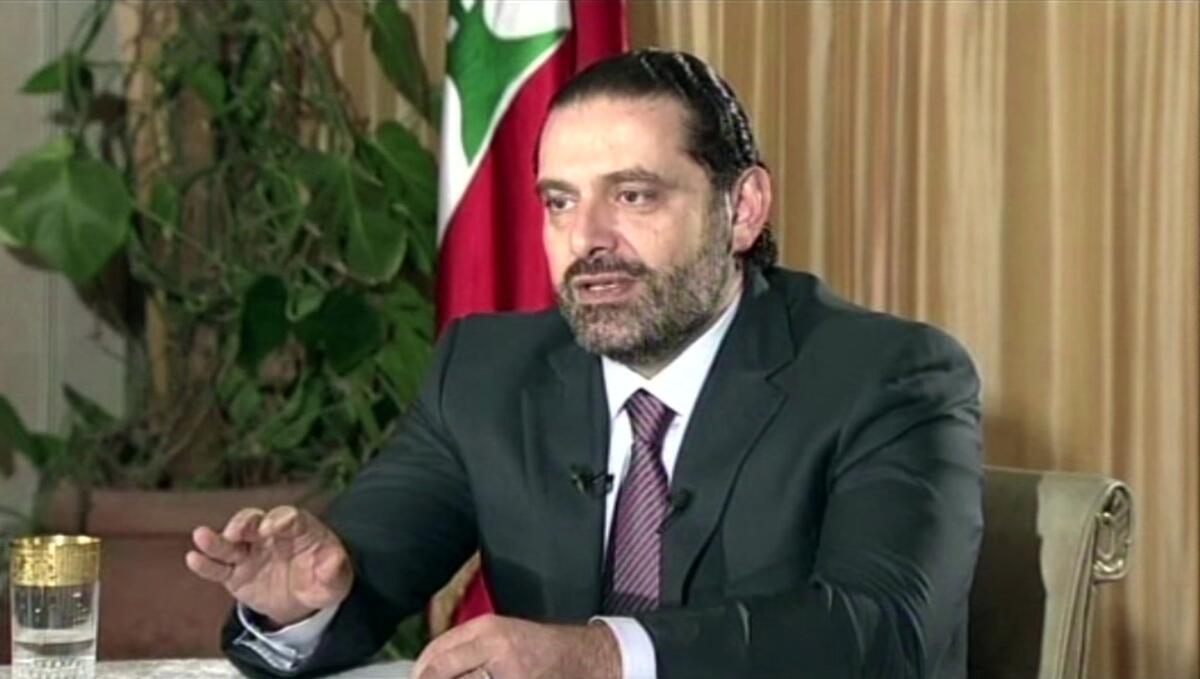 Lebanese Prime Minister Saad Hariri gives a live TV interview in Riyadh, Saudi Arabia, on Sunday.