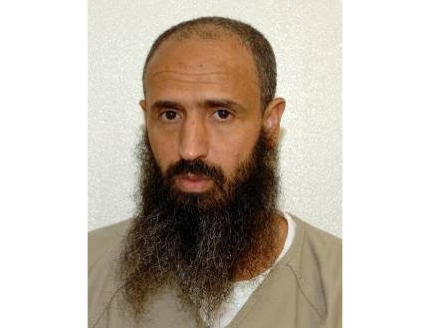 A closeup of Abdullatif Nasser in prison clothing.
