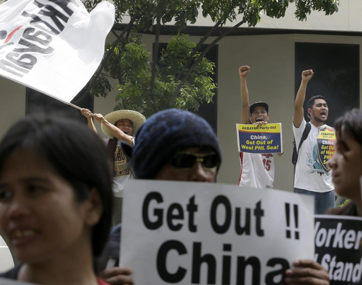 Demonstrators gather outside a Chinese consulate in the Philippines in July to protest the building of artificial islands in the South China Sea.
