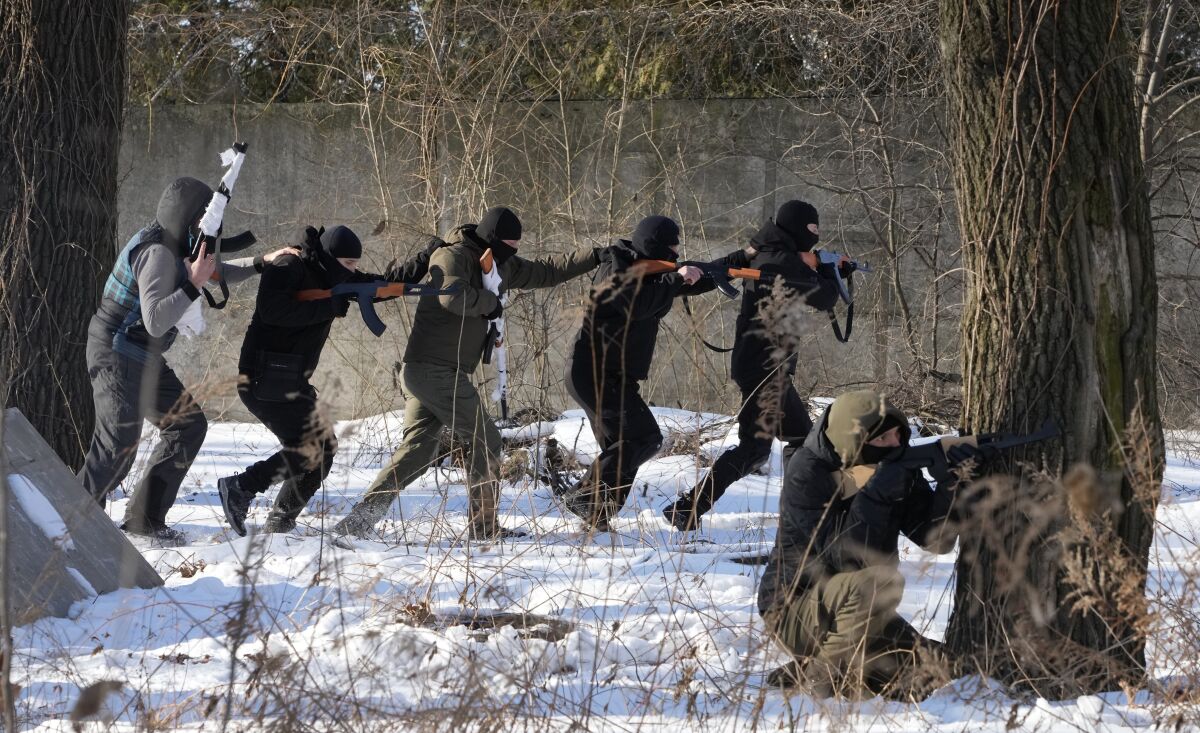 Ukrainian civilians in Kyiv, the capital, train in self-defense in case of a Russian invasion.