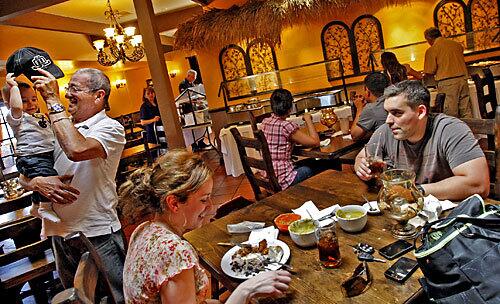 Generations of families enjoy the Cuban food at Casa Don Rolando in North Hills.