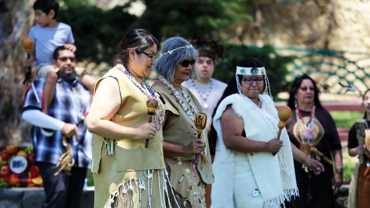 Women from the Gabrielino Tongva tribe perform "Circle of Life" a traditional dance honoring women, during the Native American Day celebration at Stough Canyon Park in Burbank this past Sunday.