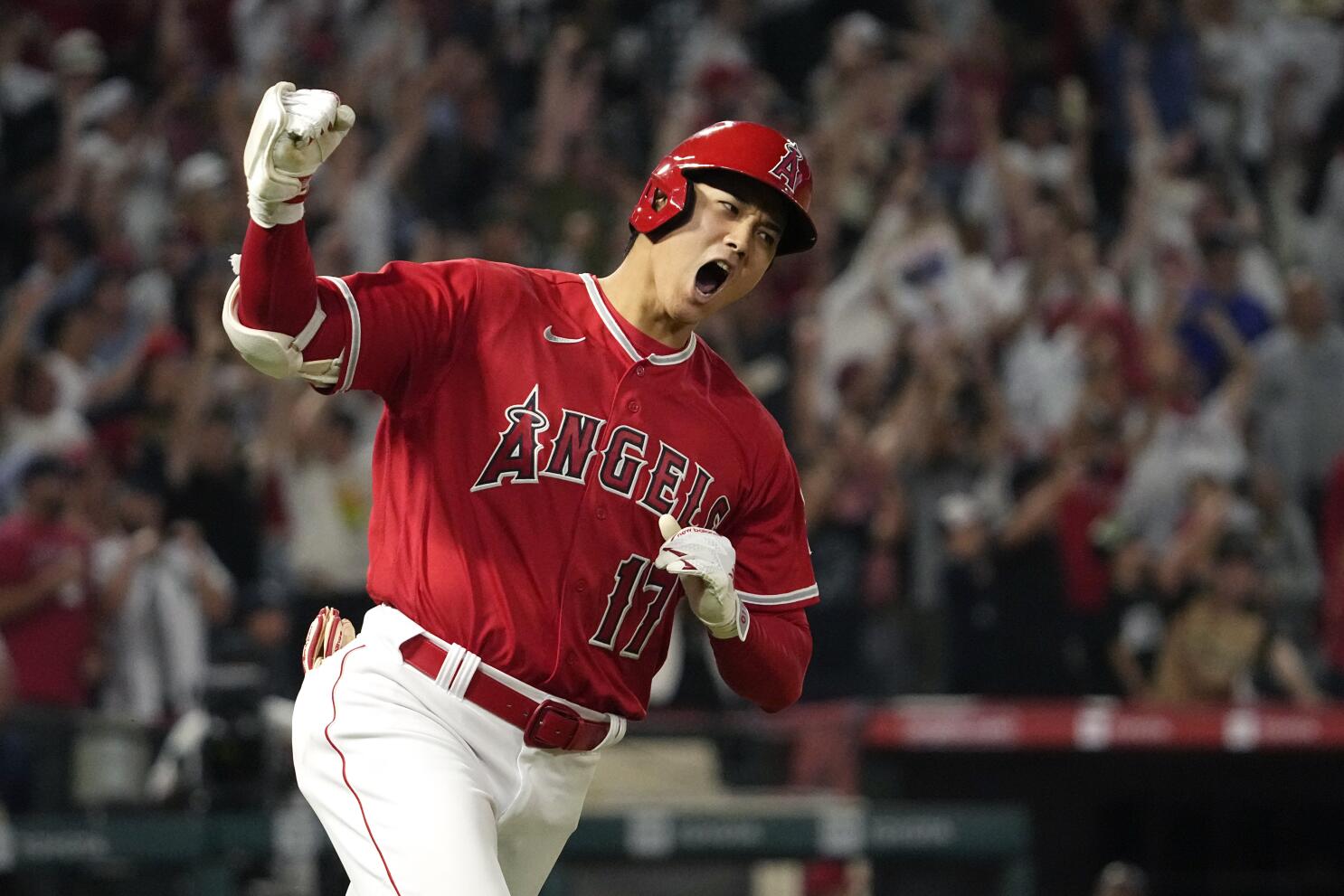 Ohtani gets win, ties for MLB home run lead as Angels beat Rangers - Los  Angeles Times