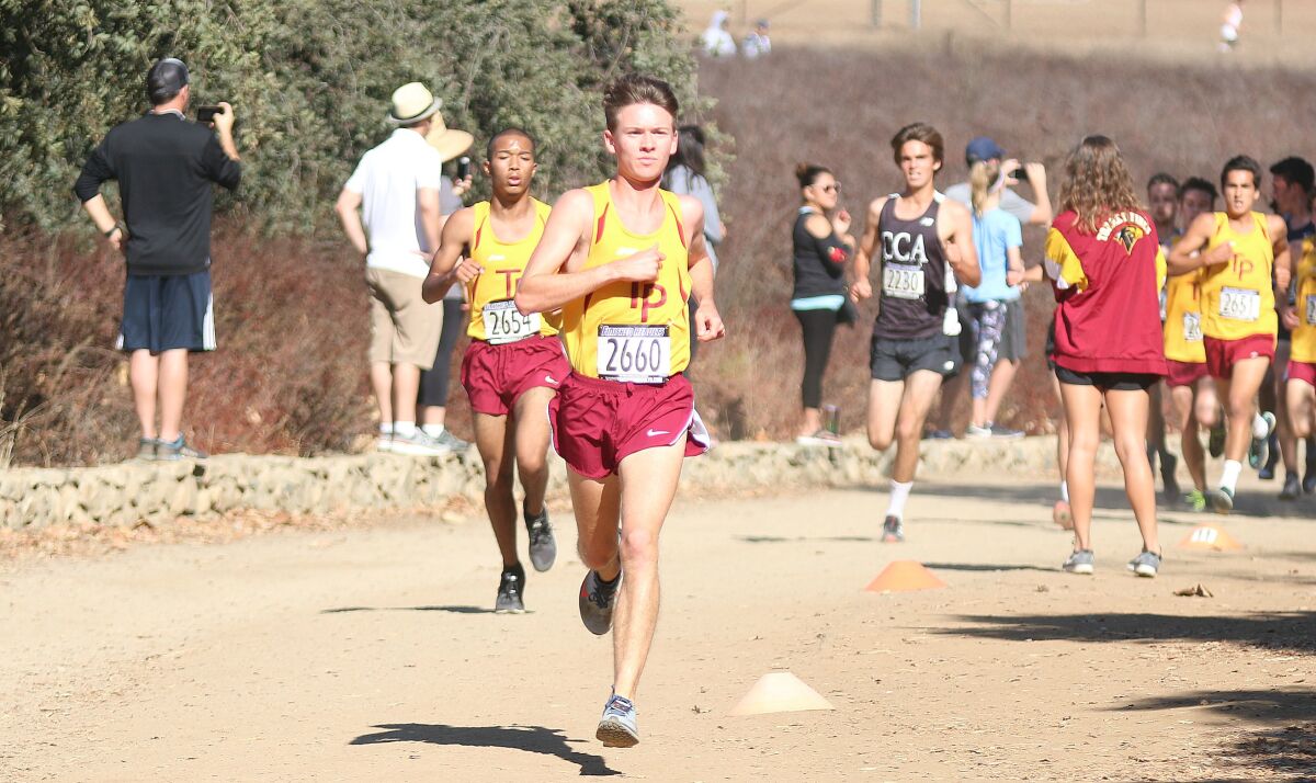 Second place finisher Nick Salz of Torrey Pines comes through the two-mile marker.
