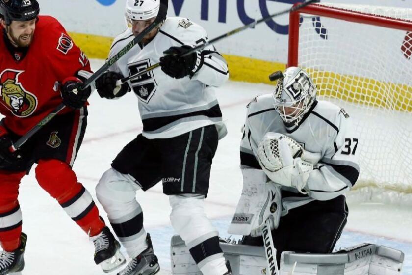 Kings goaltender Josh Zatkoff makes a save during the second period of a game in Ottawa on Nov. 11.