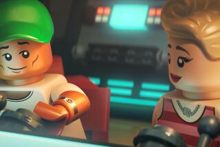 Two pop stars rendered by Legos sit at a console, speaking.