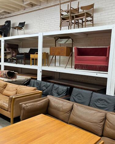 Furniture in an L.A. warehouse includes an assortment of sofas