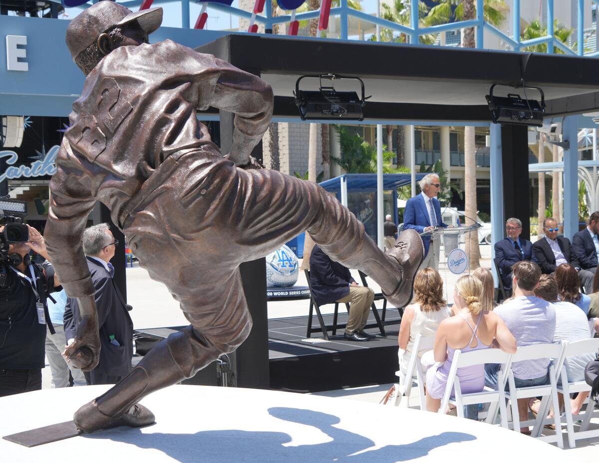 Dodgers legend Sandy Koufax speaks at his statue unveiling at Dodger Stadium on Saturday.