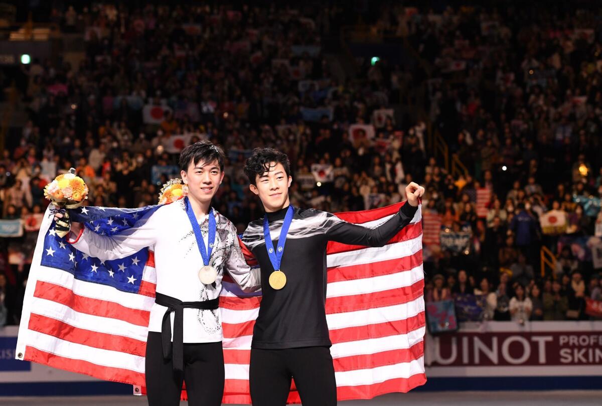 Gold medalist free skater Nathan Chen, right, and bronze winner Vincent Zhou in 2019.