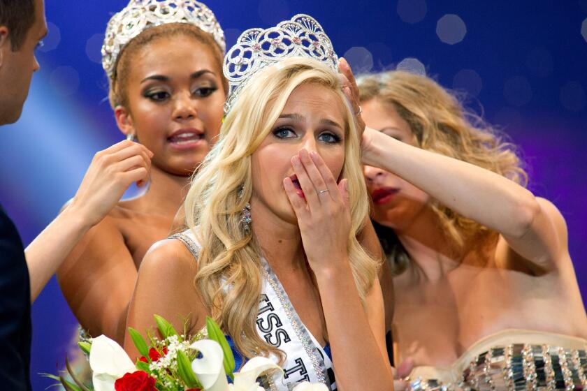 In this Aug. 10, 2013, file photo, Miss California Teen USA 2013 Cassidy Wolf is crowned.