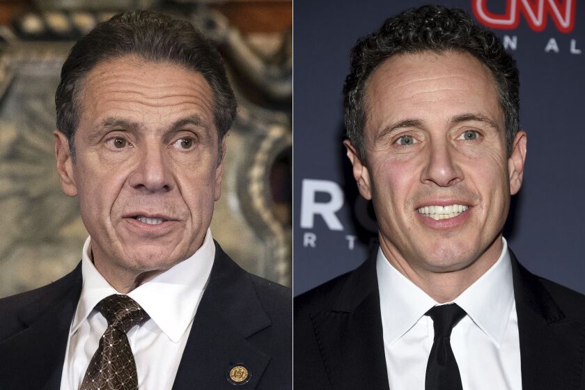 FILE - New York Gov. Andrew M. Cuomo appears during a news conference about COVID-19 at the State Capitol in Albany, N.Y., on Dec. 3, 2020, left, and CNN anchor Chris Cuomo attends the 12th annual CNN Heroes: An All-Star Tribute at the American Museum of Natural History in New York on Dec. 9, 2018. Transcripts released Monday, Nov. 29, 2021, shed new light on CNN anchor Chris Cuomo's behind-the-scenes role advising his brother, former New York Gov. Andrew Cuomo, in the face of sexual harassment allegations that forced him from office. (Mike Groll/Office of Governor of Andrew M. Cuomo via AP, left, and Evan Agostini/Invision/AP, File)