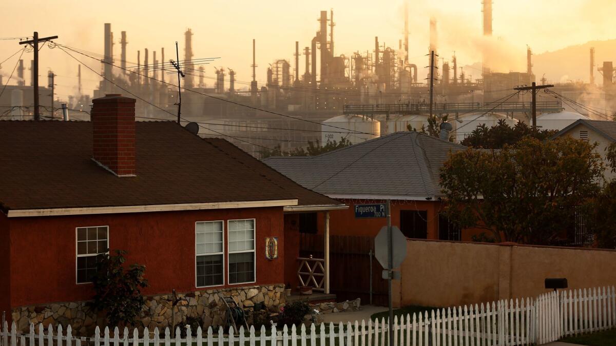 The Phillips 66 refinery looms over a Wilmington neighborhood.