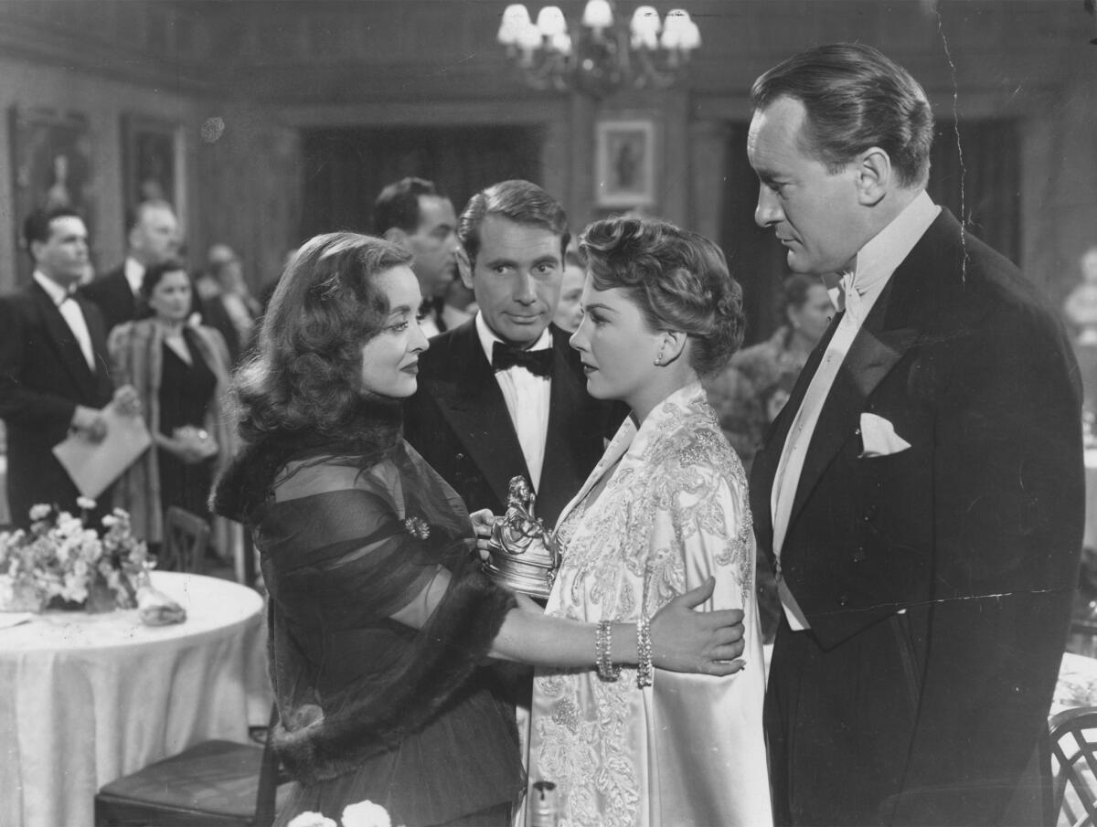  Bette Davis, left, Gary Merrill,  Anne Baxter and George Sanders in “All About Eve” (1950)