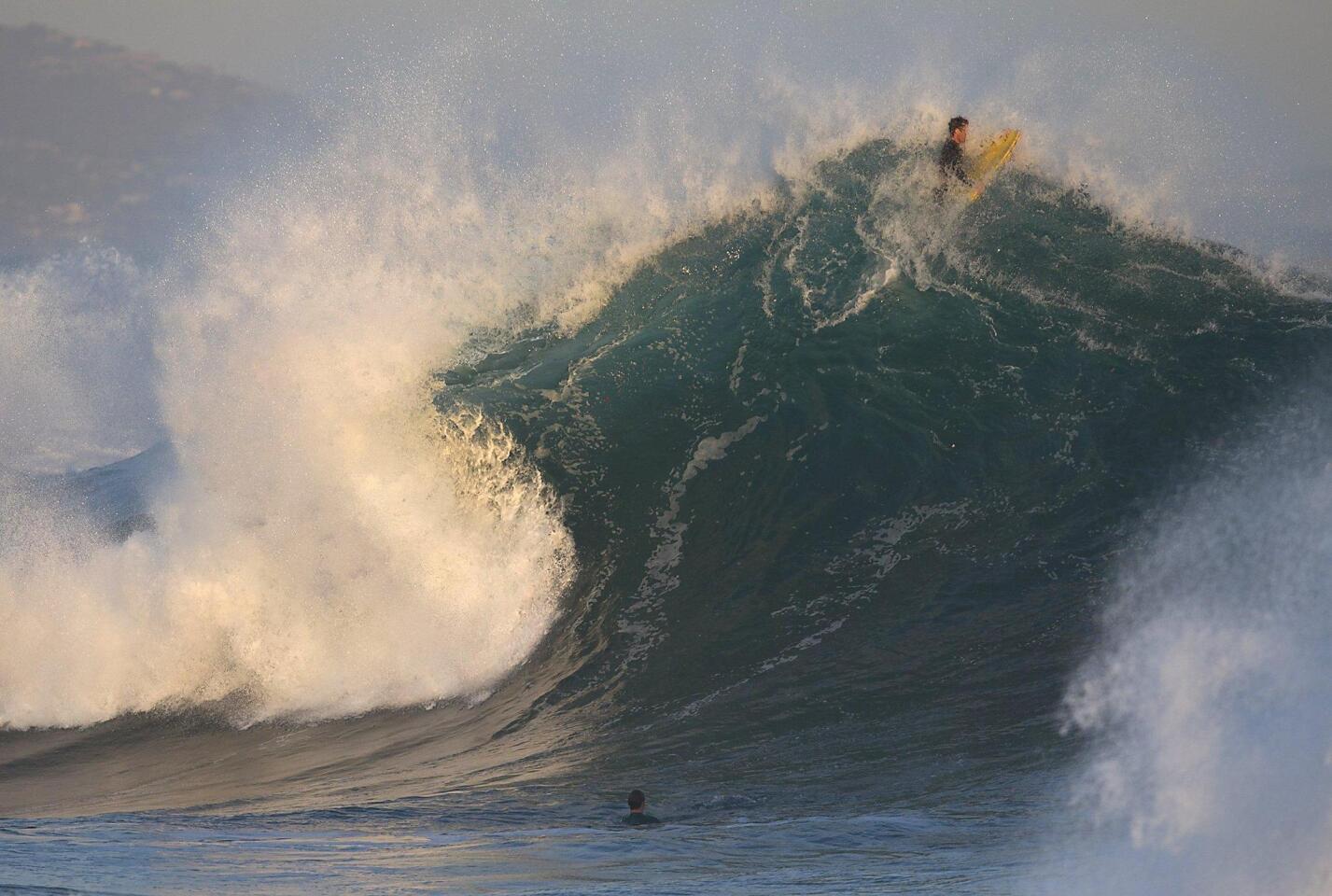 Photo Gallery: Surf reaches up to 12 feet at the Wedge
