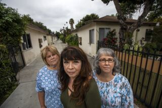 Lynwood, CA - October 14: Portrait of Cheryl Simmons, 65, of Long Beach, left, Rose Morales, 67, of Seal Beach, middle, Tina McKillip, 64, of Long Beach, right, on Friday, Oct. 14, 2022, in Lynwood, CA. They are standing near the home where Janansull "Jan" Marsh lived. "Jan" died at age 14. A group of students walking to Hosler Junior High School in Lynwood found her body in a yard in 1969, and her murder case remains unsolved. Simmons, Morales, and McKillip, all graduates of Lynwood High School have teamed up to try to solve the murder of their former classmate. (Francine Orr / Los Angeles Times)