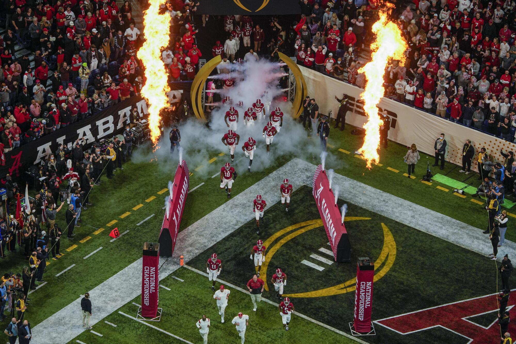 Alabama players are introduced before the College Football Playoff championship  game against Georgia.