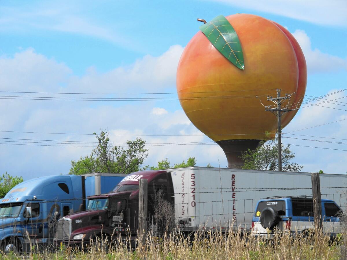 The town of Gaffney, S.C., was worried: Rumor had it that its Peachoid water tower was being torn down. In fact, it is just getting repainted.