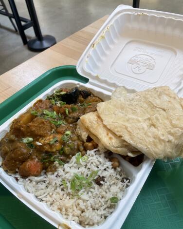 Vegan curry with rice and peas and roti at Caribbean Gourmet.