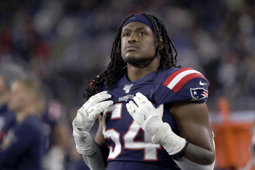 FILE - New England Patriots linebacker Dont'a Hightower watches from the sideline during the second half of an NFL football game against the New York Giants in Foxborough, Mass., Oct. 10, 2019. Dont'a Hightower is making a quiet exit to a memorable career with the New England Patriots. The veteran linebacker, who did not play last season, announced his retirement Tuesday, March 21, 2023, in an essay posted in the Players' Tribune. (AP Photo/Elise Amendola, File)