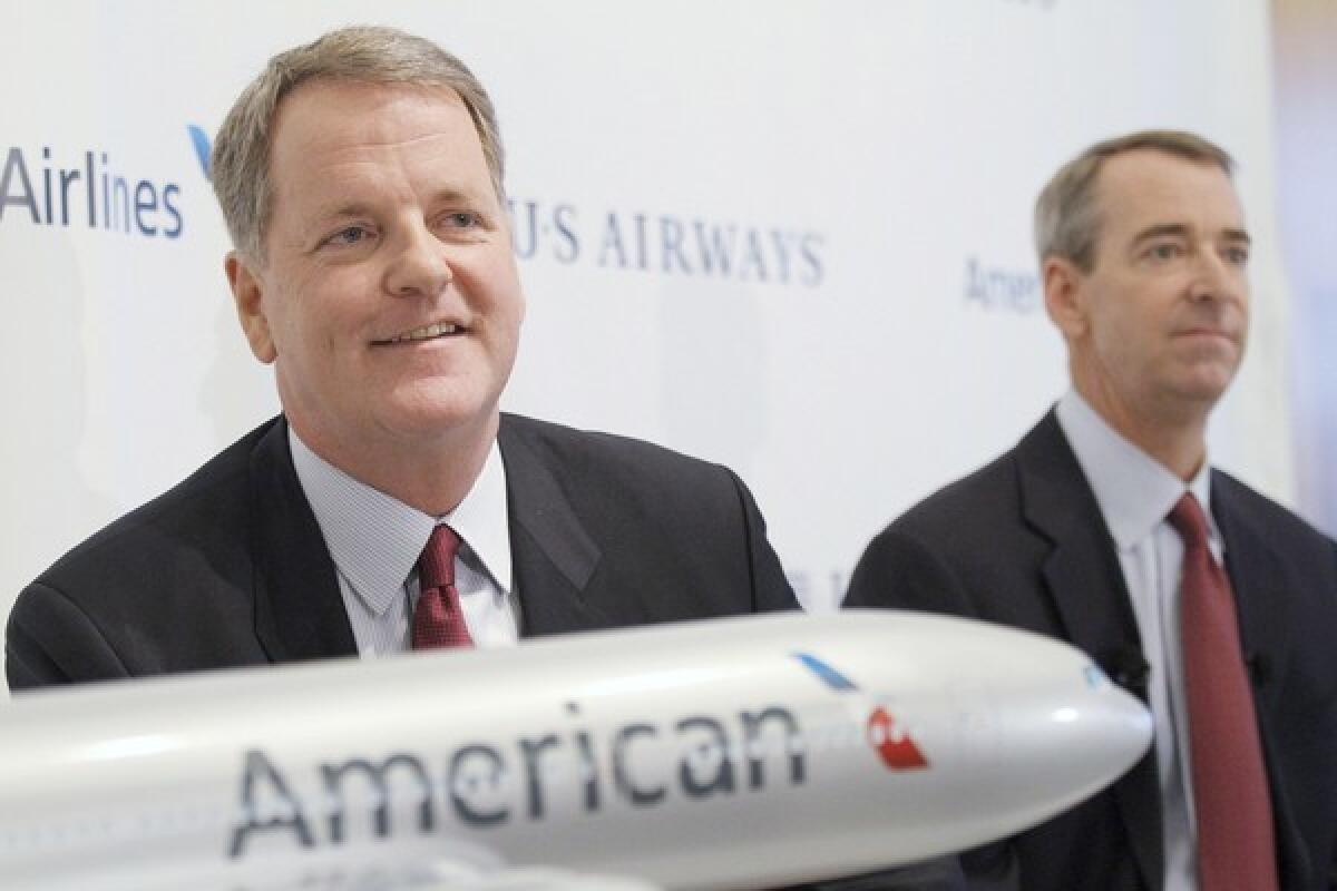 Thomas Horton, right, is stepping down as chief executive of American Airlines, to be replaced by Doug Parker, left, as CEO of the new American Airlines Group Inc. Horton will be chairman of the new airline's board.
