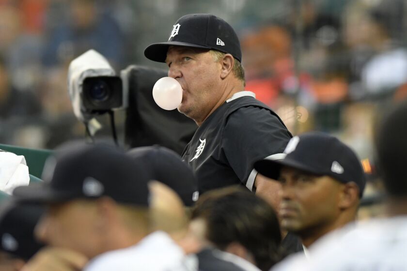 Detroit Tigers hitting coach Scott Coolbaugh, top, watches during the third inning of a baseball game between the Toronto Blue Jays against the Detroit Tigers, Friday, Aug. 27, 2021, in Detroit. (AP Photo/Jose Juarez)