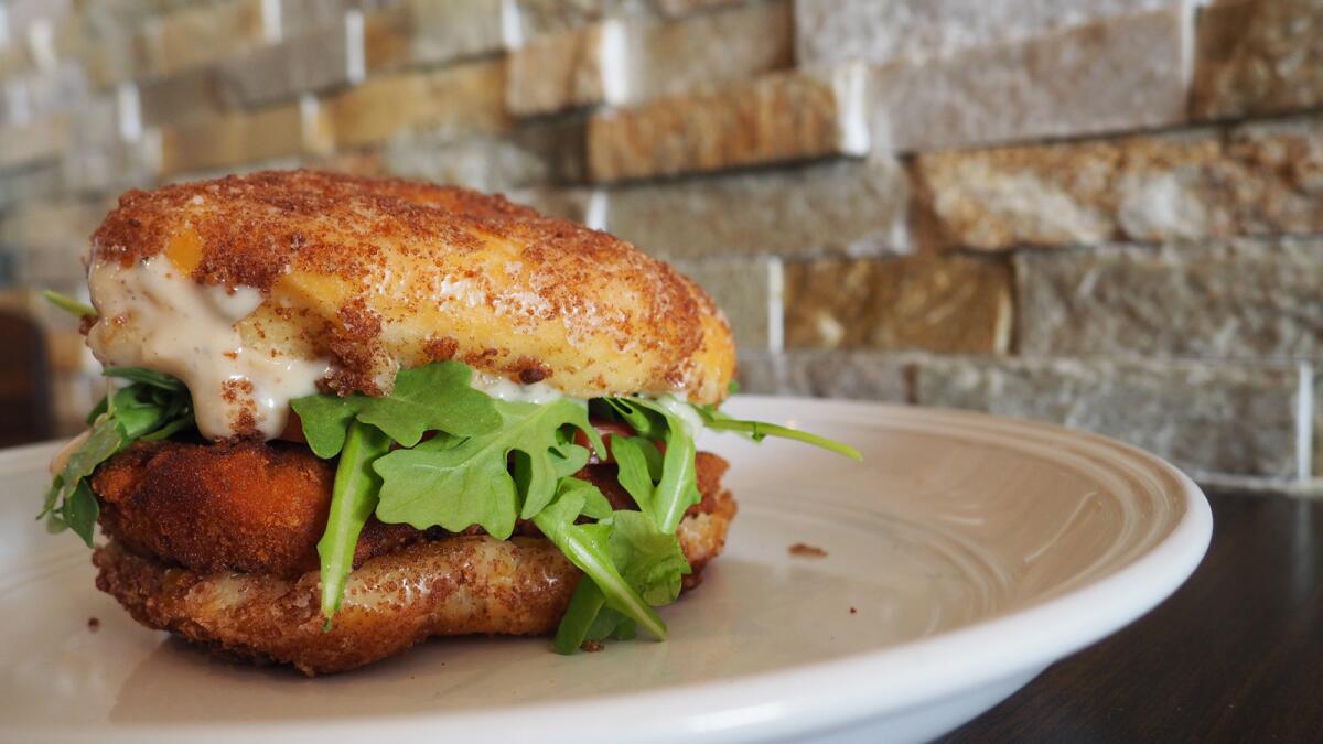 The pumpkin spice fried chicken doughnut burger from Chomp in Santa Monica.