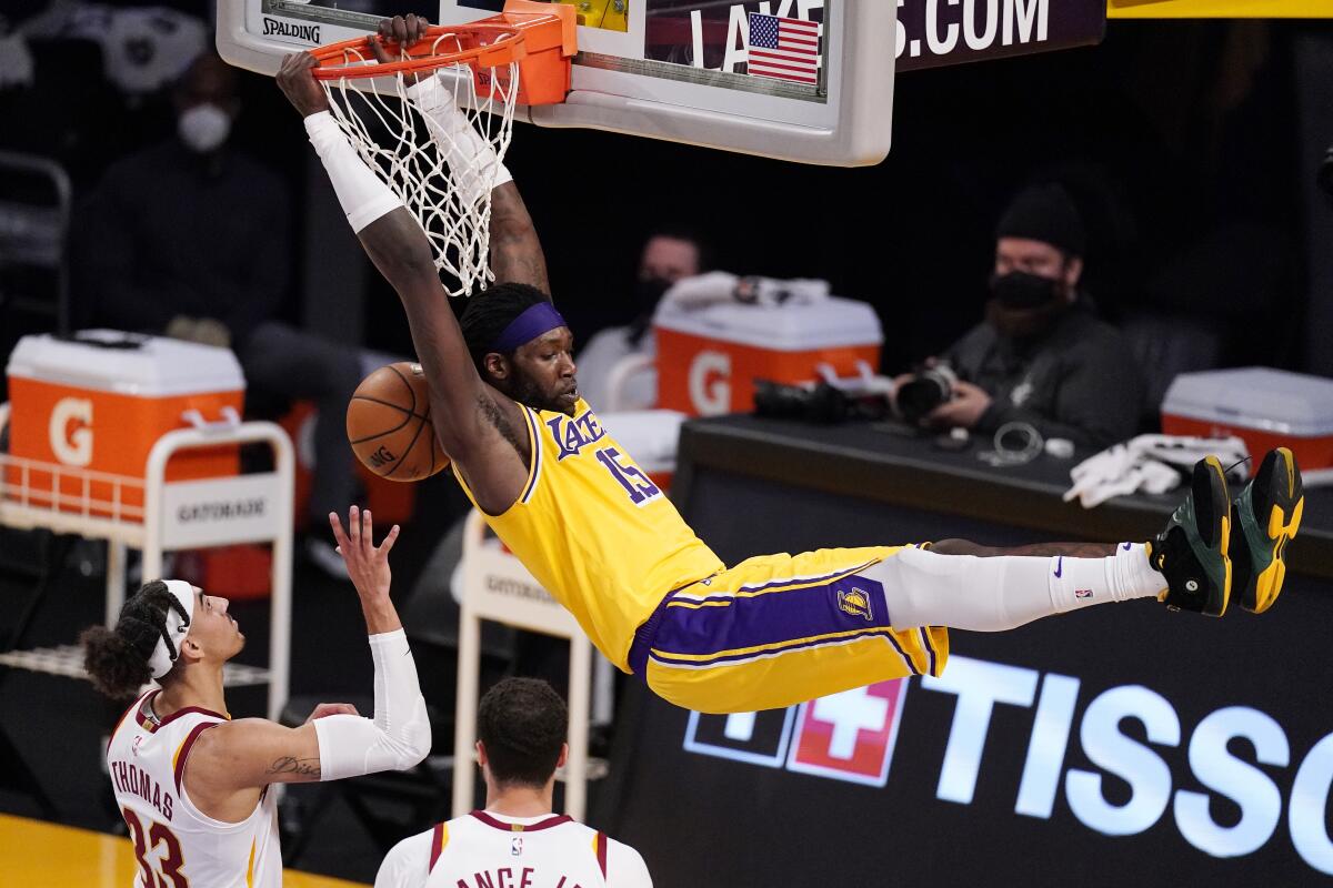 The Lakers' Montrezl Harrell dunks against the Cleveland Cavaliers on March 26, 2021.