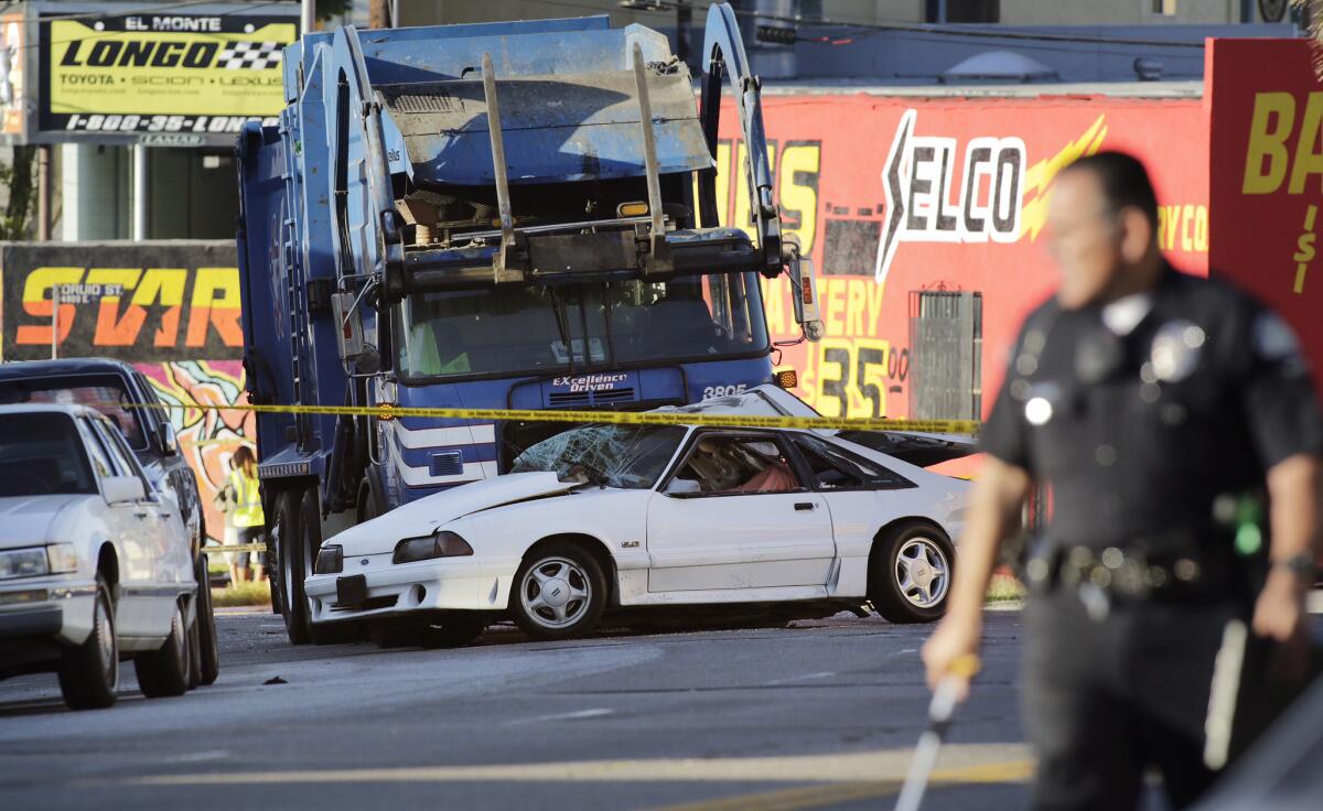 In discussing the dangerous habits of drivers and pedestrians, City Council members were told Wednesday that 225 people a year die on Los Angeles streets -- half of them cyclists and pedestrians. Above, the scene of a fatal crash in El Sereno.