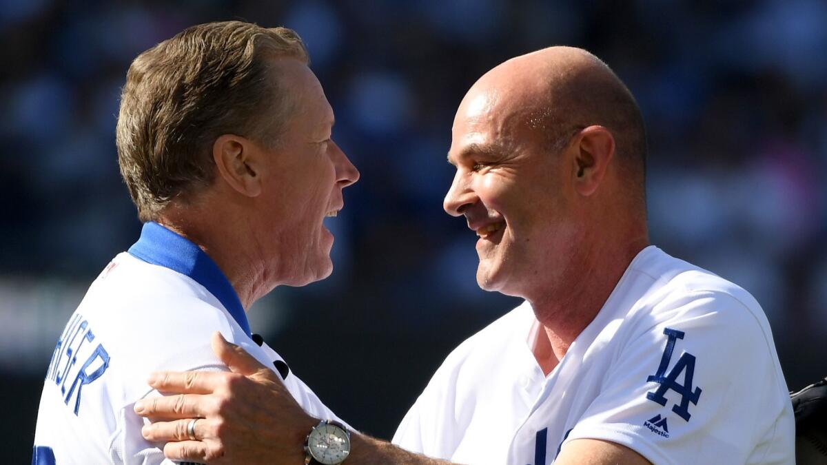 Orel Hershiser and Kirk Gibson before Thursday's home opener.