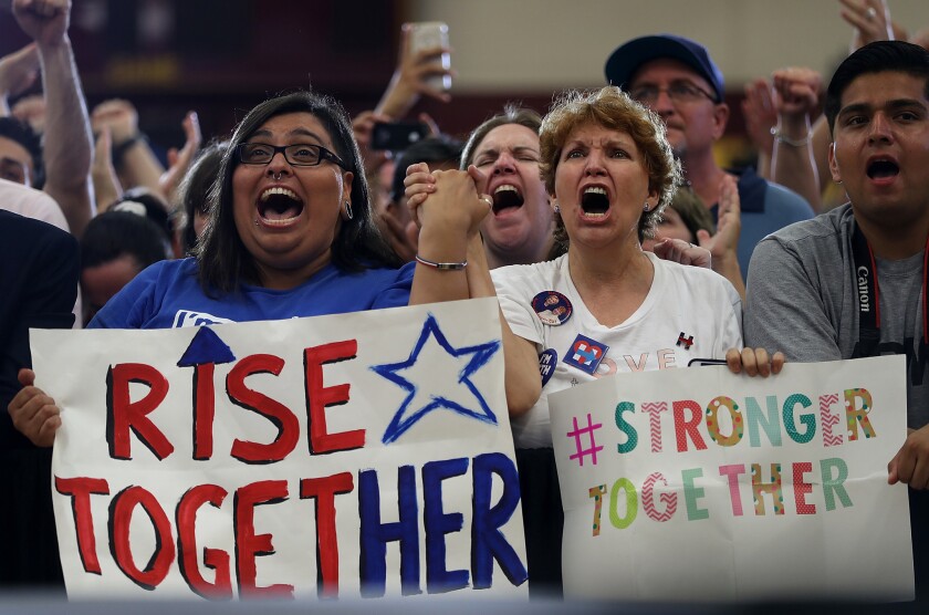 Supporters cheer for Hillary Clinton last Sunday in Sacramento.